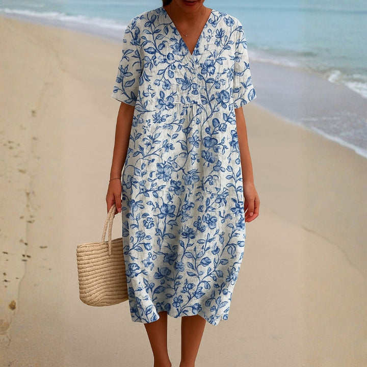 Magnolia - Ivory Dress Adorned with Porcelain Blue Floral Accents